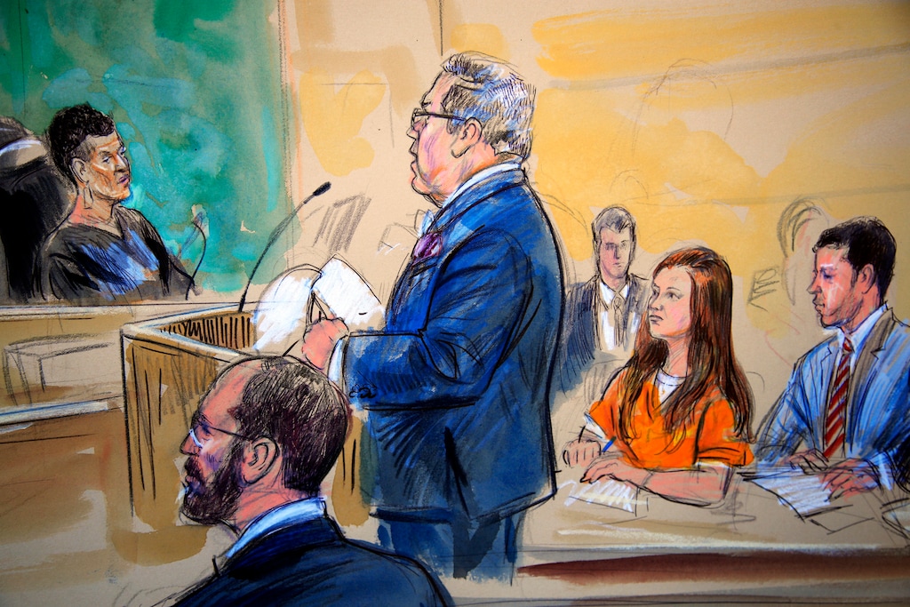 This courtroom sketch depicts Maria Butina, in orange suit, a 29-year-old gun-rights activist suspected of being a covert Russian agent, listening to her attorney Robert Driscoll, standing, as he speaks to Judge Deborah Robinson, left, during a hearing in federal court in Washington, Wednesday, July 18, 2018. Assistant U.S. Attorney Erik Kenerson, bottom left, and co-defense attorney's Alfred Carry, right, listen. Prosecutors say Butina was likely in contact with Kremlin operatives while living in the United States. And prosecutors also are accusing her of using sex and deception to forge influential connections. (Dana Verkouteren via AP)