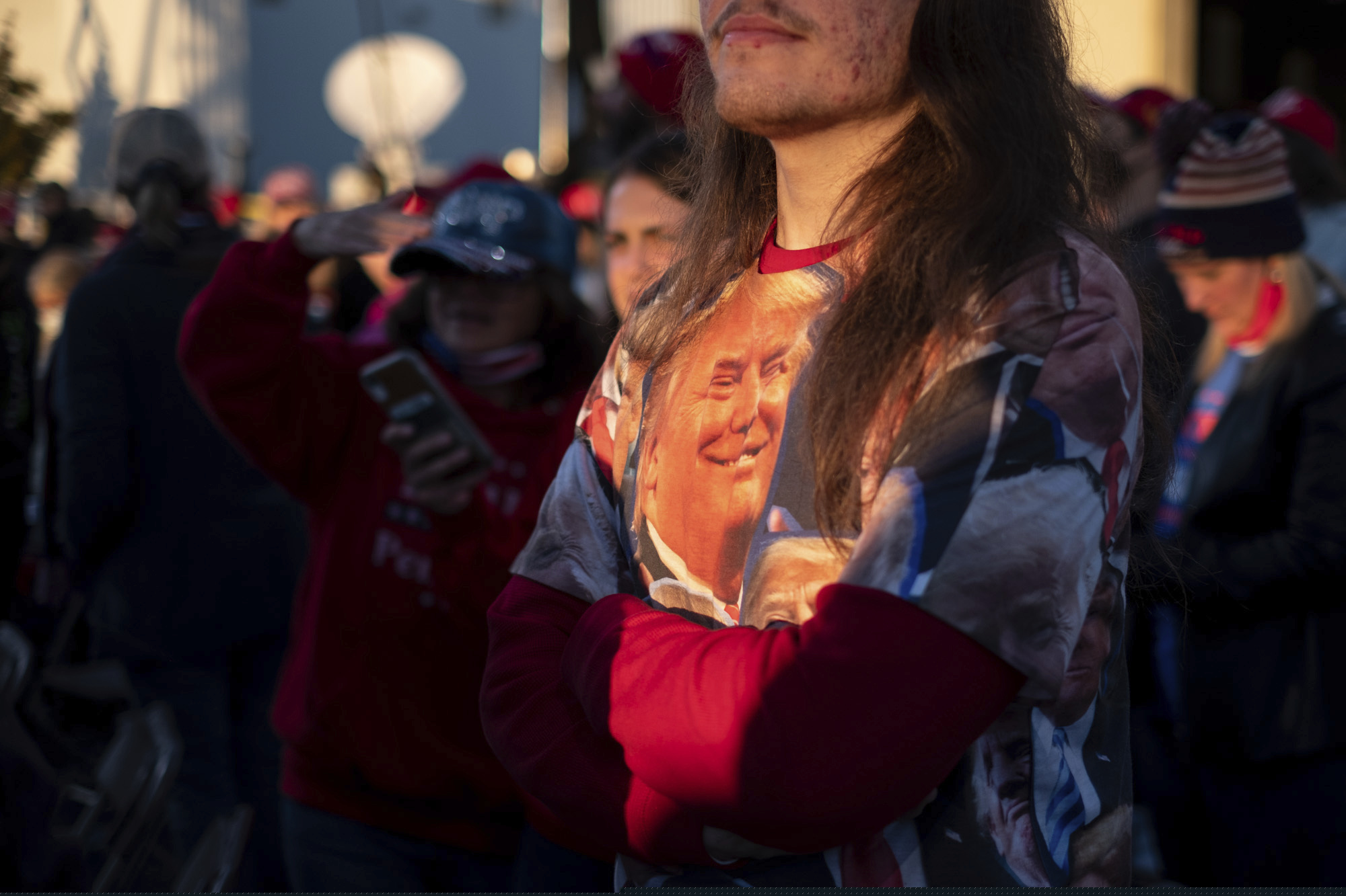 (Ben Gray | AP photo) Garrett Graham, who traveled from West Virginia, waits for the start of a rally featuring President Donald Trump for U.S. Senators Kelly Loeffler, R-Ga., and David Perdue, R-Ga., Saturday in Valdosta, Ga. President Donald Trump’s first political rally since losing the election is meant to boost Republican incumbents campaigning in the two Georgia runoffs that will decide which party controls the Senate.