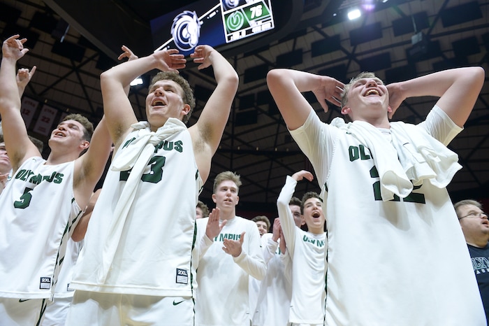 (Leah Hogsten | The Salt Lake Tribune) Olympus celebrates the win. Olympus defeated Corner Canyon 76-49 to win the 5A High School Boys’ Basketball Tournament Championship at the Jon M. Huntsman Center in Salt Lake City, Saturday, March 3, 2018.