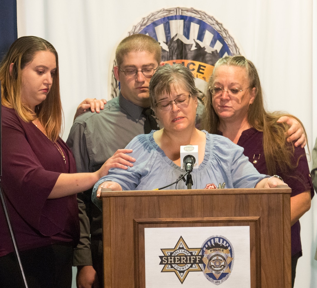 (Rick Egan  |  The Salt Lake Tribune) Jeanne Long, sister of homicide victim Valerie Sue Brantzeg, is accompanied by family members at a press conference at the Salt Lake County Sheriff's office, Friday, Sept. 7, 2018. Formal charges have been filed against Walter Eugene Brantzeg, Valerie's estranged husband, in her death.