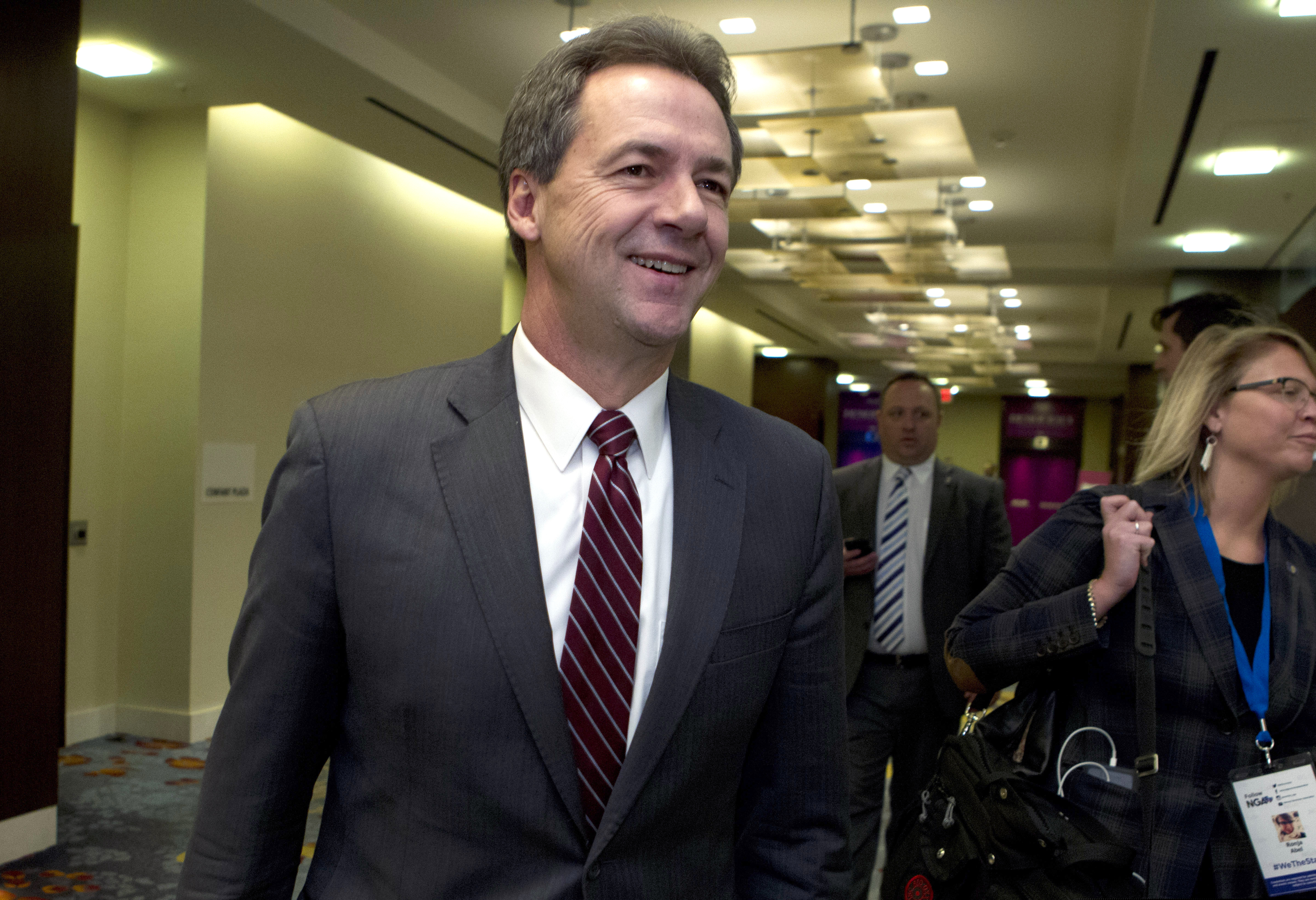 (Jose Luis Magana | AP FIL PHOTO) Montana Gov. Steve Bullock walks to a meeting during the National Governors Association 2019 winter meeting in Washington. Bullock, a Democrat, announced Tuesday that he is running for president of the United States.