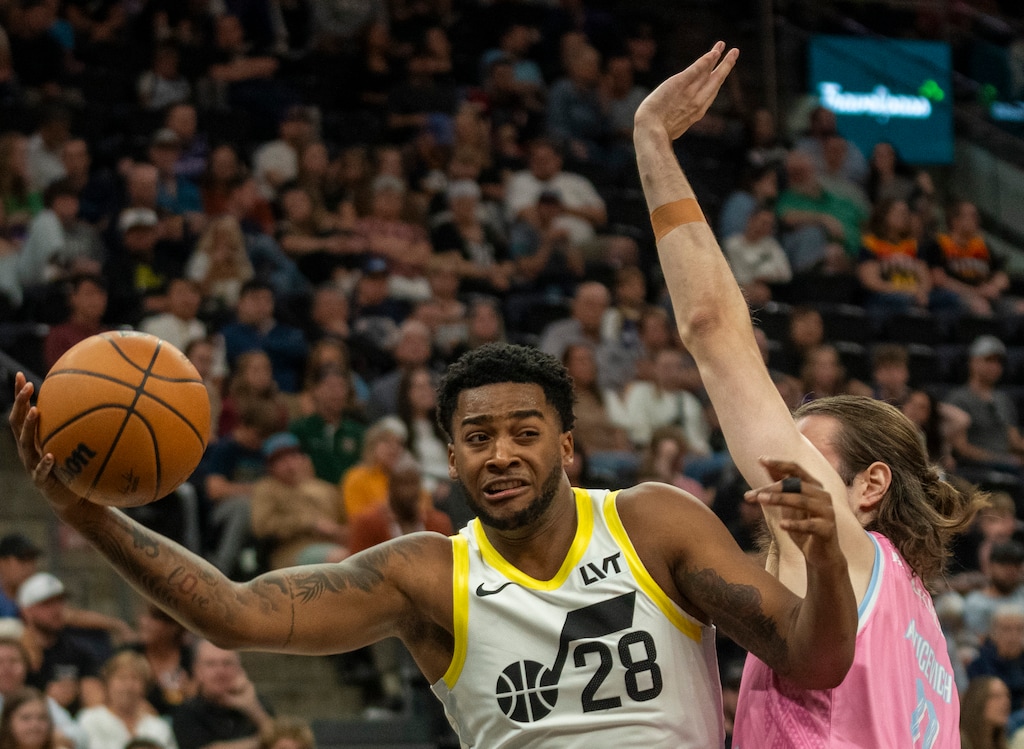(Rick Egan | The Salt Lake Tribune) Utah forward Brice Sensabaugh (28) grabs a rebound as New Zealand Breakers guard Grant Anticevich (11) defends, in Preseason action between the New Zealand Breakers and the Utah Jazz, on Friday, Oct. 4, 2024. 