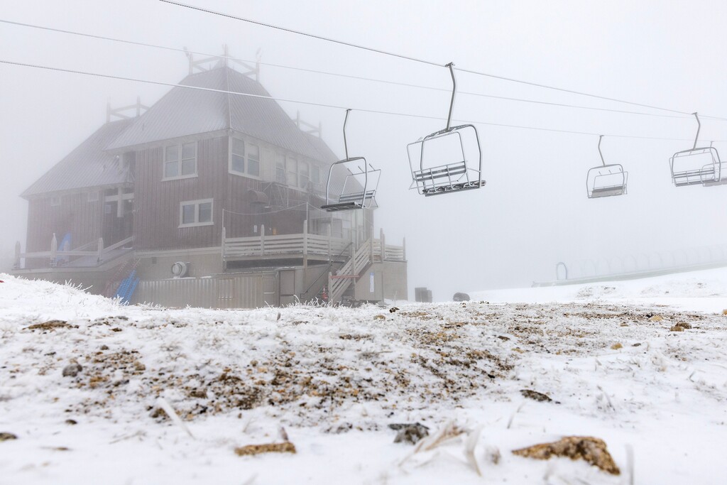 (Alisha Jucevic | The New York Times) The main lodge and beginner lift, Sonnet, are seen at Mt. Ashland near Ashland, Ore. on Wednesday, Dec. 27, 2023. Opening day still felt far-off to many of the core crew members at Mt. Ashland near Ashland, Ore., after a recent storm left only a couple of inches of fresh snow on the mountain.
