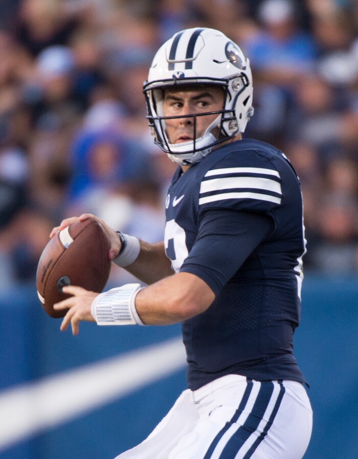 (Rick Egan  |  The Salt Lake Tribune)    Brigham Young Cougars quarterback Tanner Mangum (12) looks to pass, in football action Brigham Young Cougars vs McNeese State Cowboys at Lavell Edwards Stadium, Saturday, Sept. 22, 2018.


