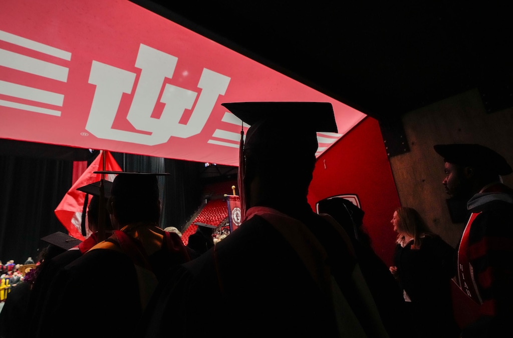 (Francisco Kjolseth  |  The Salt Lake Tribune) University of Utah graduates enter the Huntsman Center for commencement ceremonies on Thursday, May 2, 2024.