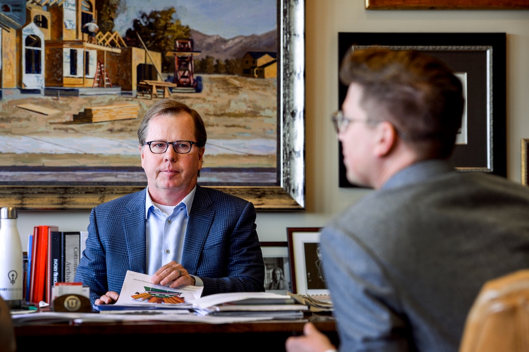 Leah Hogsten  |  The Salt Lake Tribune  l-r Clark Ivory leans on his vice president of public affairs, marketing and senior economist, Michael Parker, right. Clark Ivory, Ivory Homes CEO, Utah's most prominent homebuilders, says he is obsessed with solving the puzzle of affordability housing, even if that includes fighting residents and city officials in several communities over higher building densities.