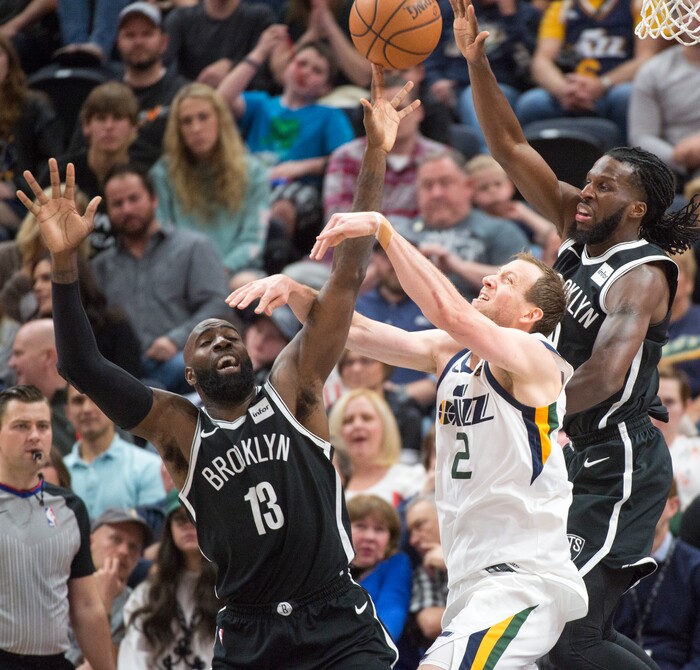 (Rick Egan  |  The Salt Lake Tribune) Utah Jazz forward Joe Ingles (2) goes for a rebound along with Brooklyn Nets forward Quincy Acy (13) and Brooklyn Nets forward DeMarre Carroll (9), in NBA action, Utah Jazz vs. Brooklyn Nets, in Salt Lake City, Saturday, November 11, 2017.