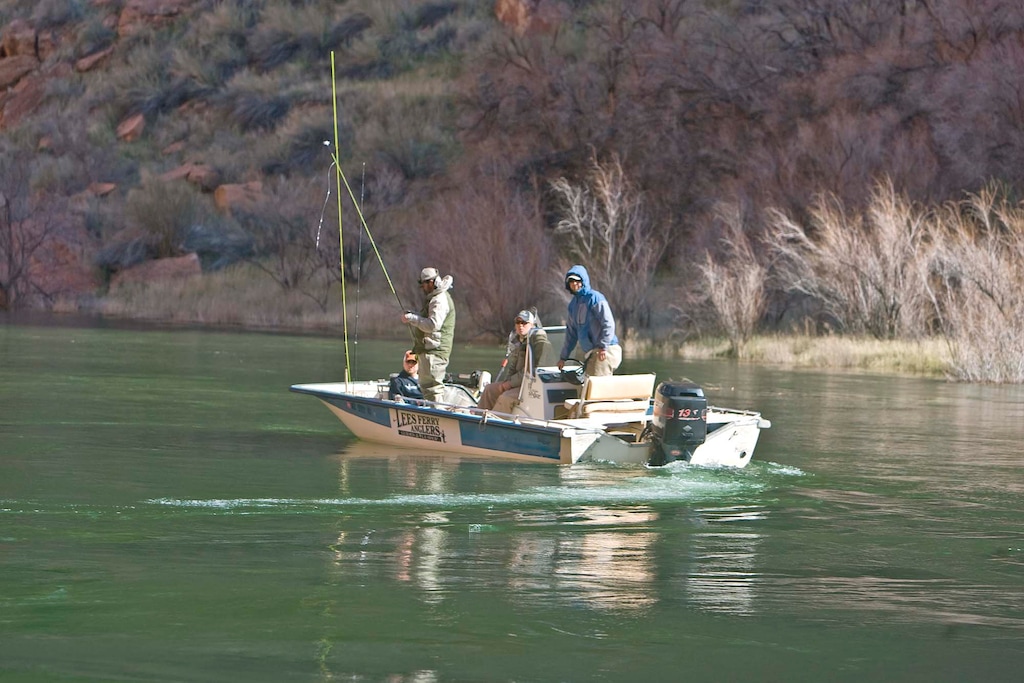 (Paul Fraughton | Tribune file photo) In this 2008 file photo, fishermen from Lee's Ferry try their luck on the Colorado River below Glen Canyon Dam after valves were opened, sending water surging into the river and raising the levels.