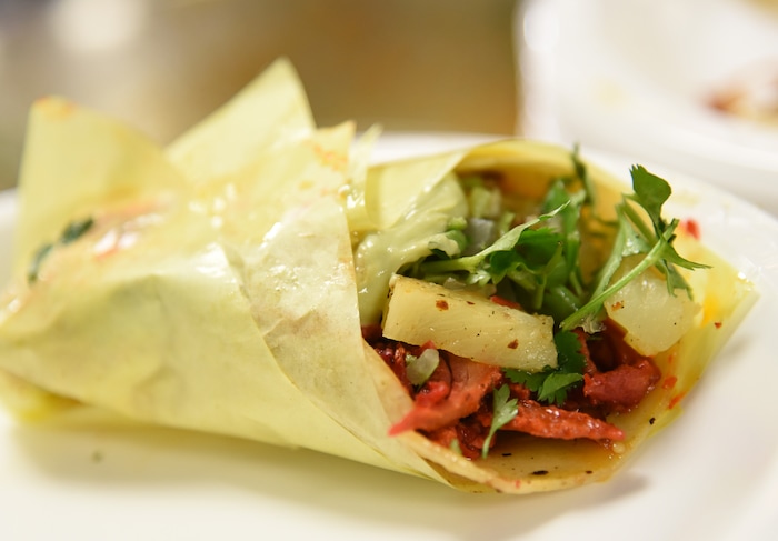 (Francisco Kjolseth  |  The Salt Lake Tribune)  Tacos al pastor with the works at Tacos Mi Caramelo, a late-night taqueria that is open until 2 a.m. most nights and 24-hours a day on Friday and Saturday.