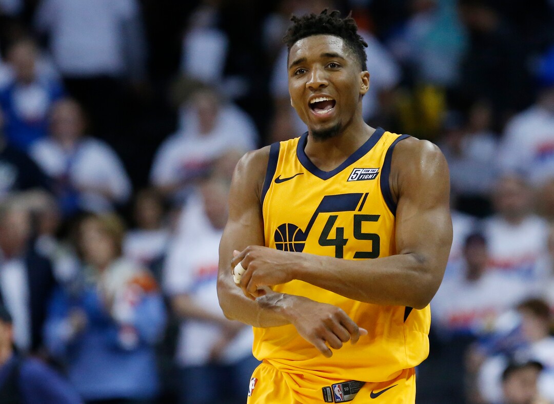 Utah Jazz guard Donovan Mitchell celebrates after the Jazz defeated the Oklahoma City Thunder in Game 2 of an NBA basketball first-round playoff series in Oklahoma City, Wednesday, April 18, 2018. (AP Photo/Sue Ogrocki)