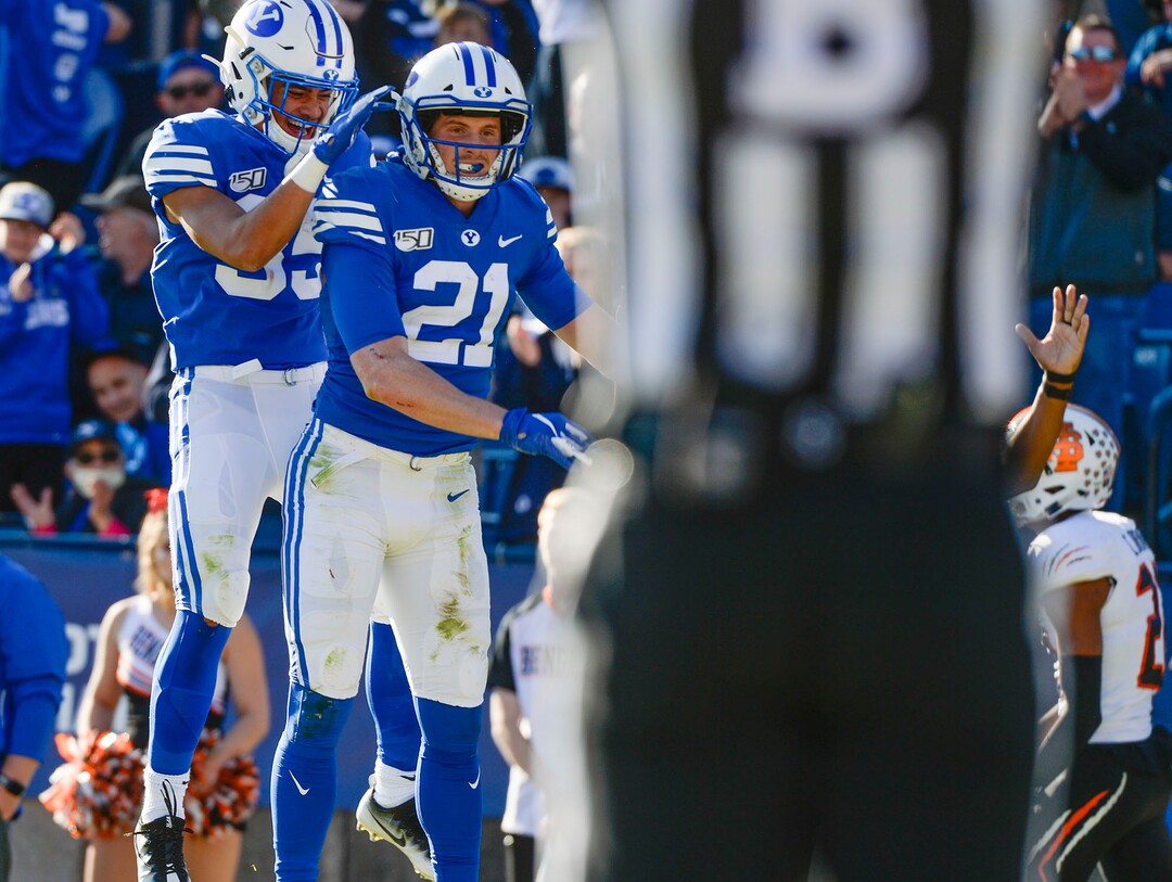 (Leah Hogsten  |  The Salt Lake Tribune) Brigham Young Cougars running back Sione Finau (35) celebrates Brigham Young Cougars wide receiver Talon Shumway (21) touchdown as Brigham Young University takes on Idaho State, Saturday, Nov. 16, 2019 at LaVell Edwards Stadium.