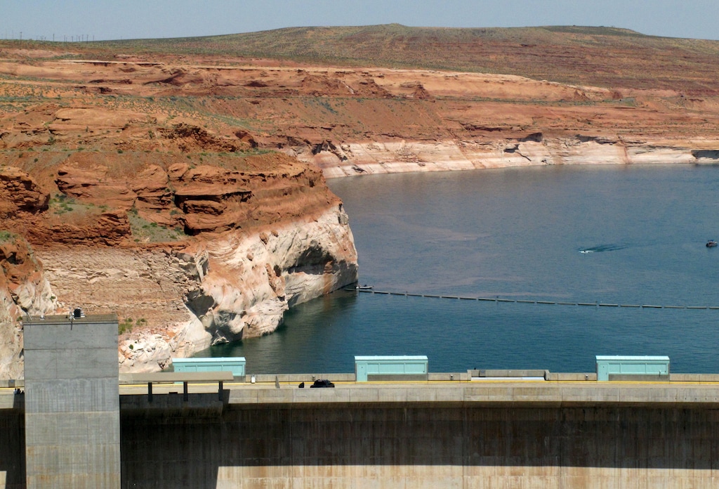 (Felicia Fonseca/Associated Press file photo) This June 21, 2015 file photo shows Lake Powell behind Glen Canyon Dam near Page, Ariz. Forecasters say one of the most important reservoirs in the Southwestern U.S. will likely collect less than half its normal amount of spring runoff this year because of a warm, dry winter across much of the region.