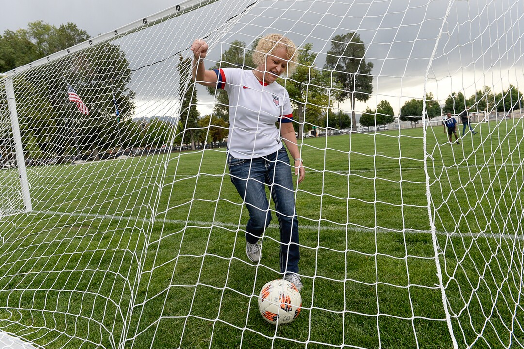 (Francisco Kjolseth  |  The Salt Lake Tribune)  Mayor Jackie Biskupski takes a turn as goalkeeper against her son Archie, 9, on the new multi-use field at Pioneer Park on Tuesday, Sept. 10, 2019. Salt Lake CityÕs Parks and Public Lands Division invited the public to attend a jubilee in celebration of the recently completed improvements at park, including enhanced lighting, a new walking path and trees and increased recreation and event programming for visitors and residents.