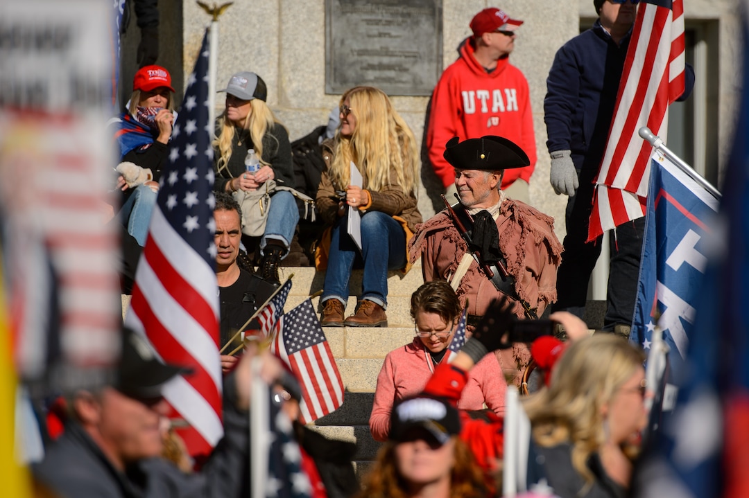 (Trent Nelson  |  The Salt Lake Tribune) A group of Trump supporters listens to speeches at the State Capitol in Salt Lake City on Wednesday, Jan. 6, 2021.
