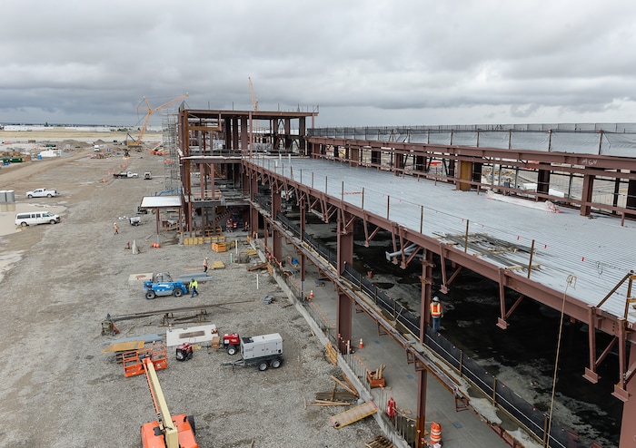 (Francisco Kjolseth  |  The Salt Lake Tribune)  The Salt Lake City Department of Airports gives a tour of the progress being made to replace the three aging terminals with a single central terminal building. Over time, the existing terminal, parking garage and concourses will be completely demolished and replaced with an estimated completion date of 2025.