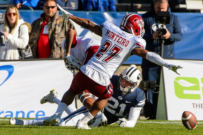 (Trent Nelson | The Salt Lake Tribune)  Brigham Young Cougars wide receiver Talon Shumway (21) reaches for a pass with Massachusetts Minutemen cornerback Isaiah Rodgers (9) defending. The pass was incomplete as BYU hosts the University of Massachusetts, NCAA football in Provo, Saturday November 18, 2017.