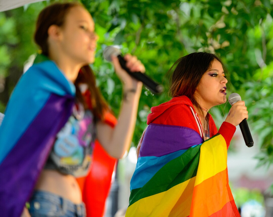 (Trent Nelson  |  The Salt Lake Tribune)Racheal Thomas and Grace Russell singing on the karaoke stage at the Utah Pride Festival in Salt Lake City on Saturday June 1, 2019.