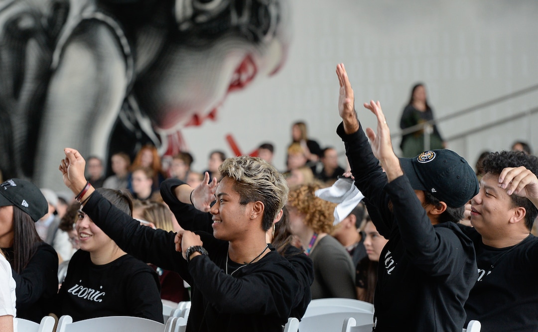 (Francisco Kjolseth  |  The Salt Lake Tribune)  Staff join the crowd as they move to the sounds of Utah band Foreign Figures during EncircleÕs 2nd annual LGBTQ+ youth summit at Adobe headquarters in Lehi on Saturday, Dec. 1, 2018.