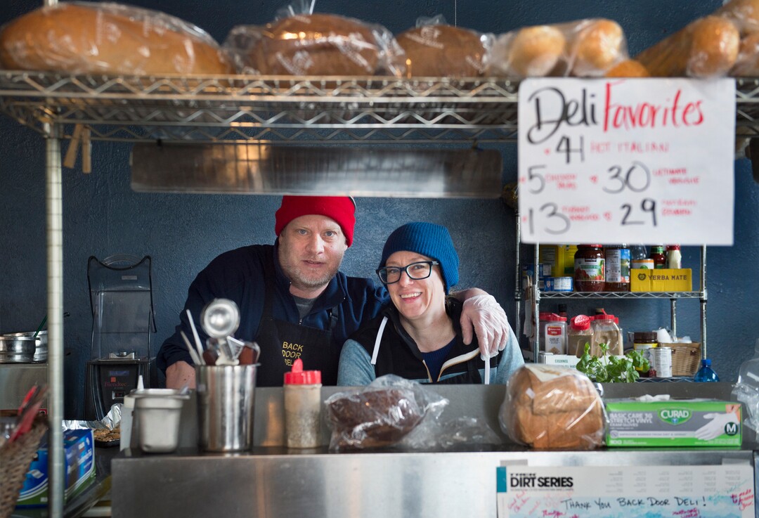 (Scott Sommerdorf   |  The Salt Lake Tribune)   Owners Colter Wade and Meg Palmer pose for a photo inside The Back Door Deli in Park City.
