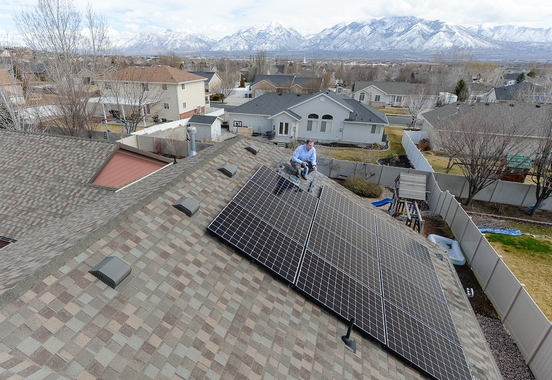 (Francisco Kjolseth  |  The Salt Lake Tribune)  Doug McAllister of South Jordan bought a solar panel array from Legend Solar last September. In December, Legend Solar started putting the panels but never finished. McAllister owes more than $12,000 on a loan he took out to finance the panels. The company has indicated to him that they are unable to hire an electrician to finish the job and the array sits idle on his roof, two panels short and unconnected. 