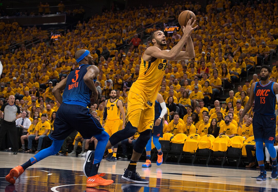 (Scott Sommerdorf | The Salt Lake Tribune)Utah Jazz center Rudy Gobert (27) spins to the basket past Oklahoma City Thunder forward Corey Brewer (3) during first quarter play. The Thunder led the Jazz 22-18 at the end of the 1st quarter during Game 6 of the first round playoff game, Friday, April 27, 2018.