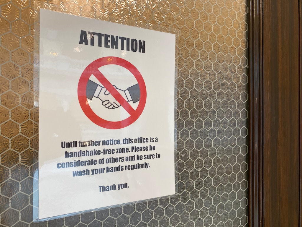 (Benjamin Wood | The Salt Lake Tribune) A sign is displayed in the Utah State Capitol discouraging people from shaking hands due to the threat of the COVID-19 coronavirus.