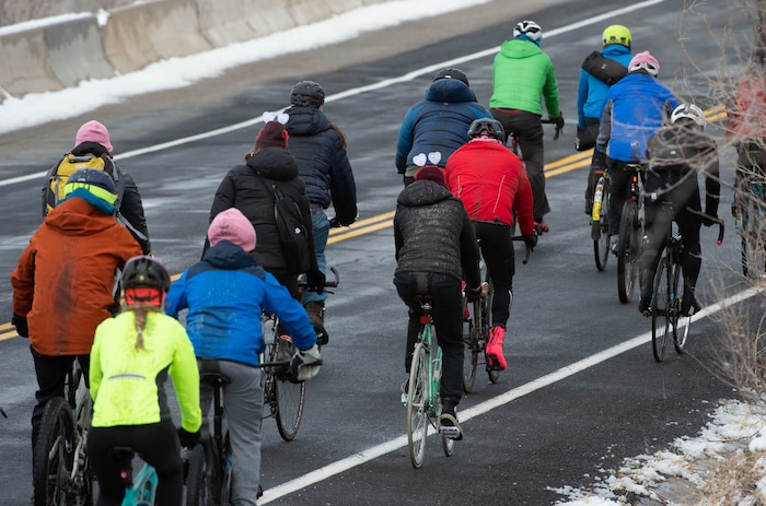 (Francisco Kjolseth  | The Salt Lake Tribune) People participate in a memorial bike ride along Wasatch Blvd in Salt Lake City on Sunday, Feb. 14, 2021, in honor of the four who died in an avalanche on Saturday, Feb. 6.