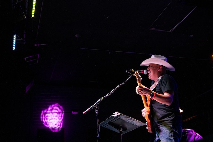 (Adriana Zehbrauskas | The New York Times) Stateline, a Navajo country band, performs at Club Red in Mesa, Ariz., Nov. 16, 2019. At highway honky-tonks, casino lounges and far-flung dance halls, a form of music that many associate with rural white America is flourishing in the heart of Indian country, and no tribe have put their own stamp on country music quite like the Navajo.