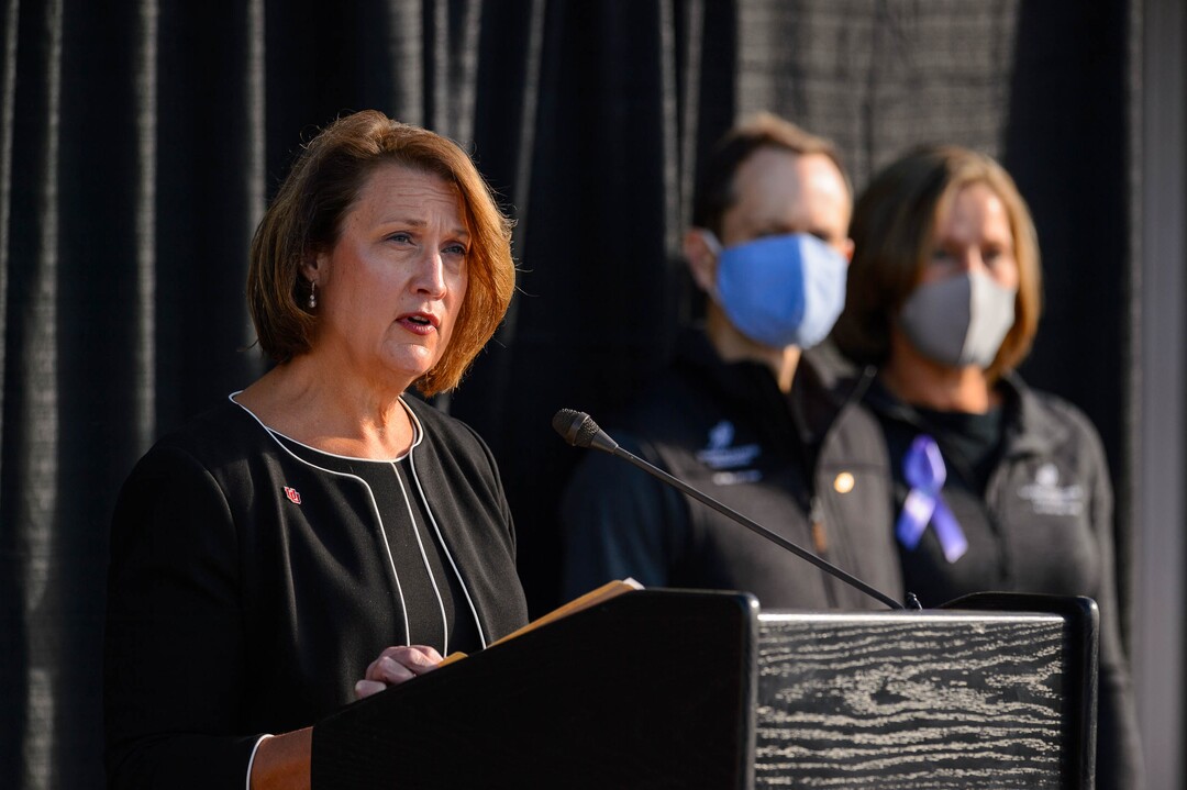 (Trent Nelson  |  The Salt Lake Tribune) University of Utah President Ruth Watkins speaks as the family of Lauren McCluskey announces a settlement of their lawsuit against the University of Utah, in Salt Lake City on Thursday, Oct. 22, 2020. Matt and Jill McCluskey are at right.