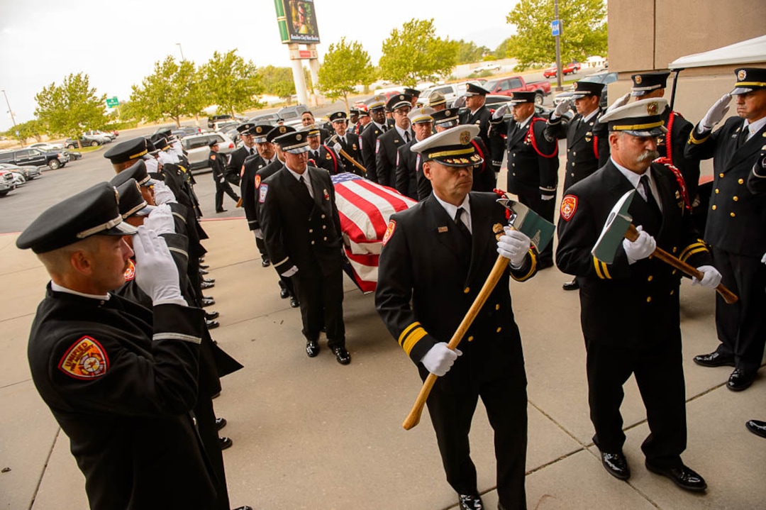 (Trent Nelson | The Salt Lake Tribune)  Honor Guard at the funeral services for Battalion Chief Matthew Burchett at the Maverik Center in West Valley City, Monday Aug. 20, 2018.