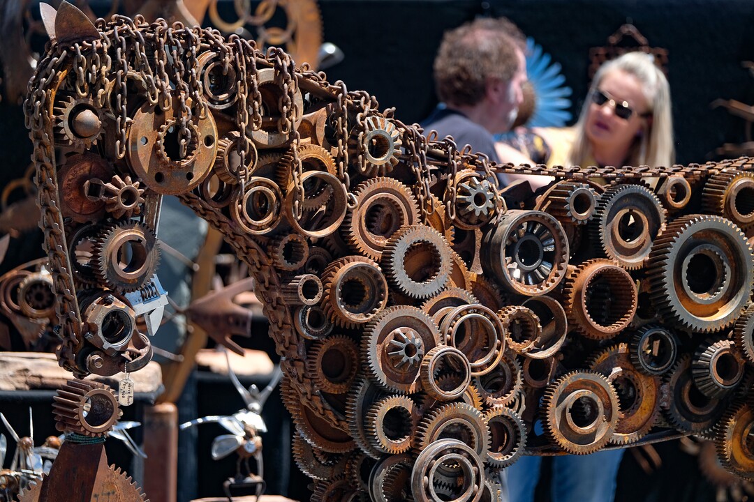 (Francisco Kjolseth  |  The Salt Lake Tribune)  Artist Jackie Nipper, right, who co-created "horsepower" along with her husband and fellow artist Charles, says the "iron diet" led to the metal art piece weighing over 2,000 pounds as they joined the Ogden Arts Festival which brings local and regional artists, creatives and entertainers to Ogden, UT on June 8th and 9th. The Ogden Arts Festival returned to the historic Union Station located in the heart of downtown. Managed by Nurture the Creative Mind and held as a fundraiser for the organization, the event was complete with artist booths, music, theater, kidÕs activities, urban arts area, skateboarding games and artisan food vendors.