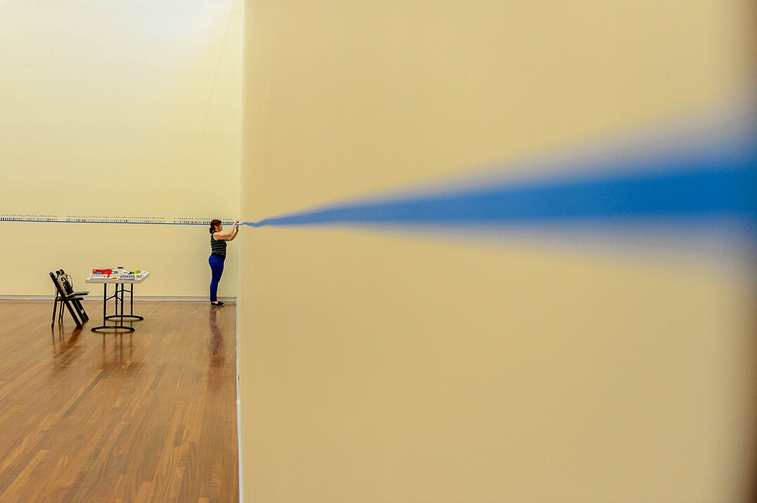 (Trent Nelson  |  The Salt Lake Tribune)  Amber Heaton at work in the Great Hall at the Utah Museum of Fine Arts in Salt Lake City. The re-imagined UMFA reopens to the public Saturday, Aug. 26.