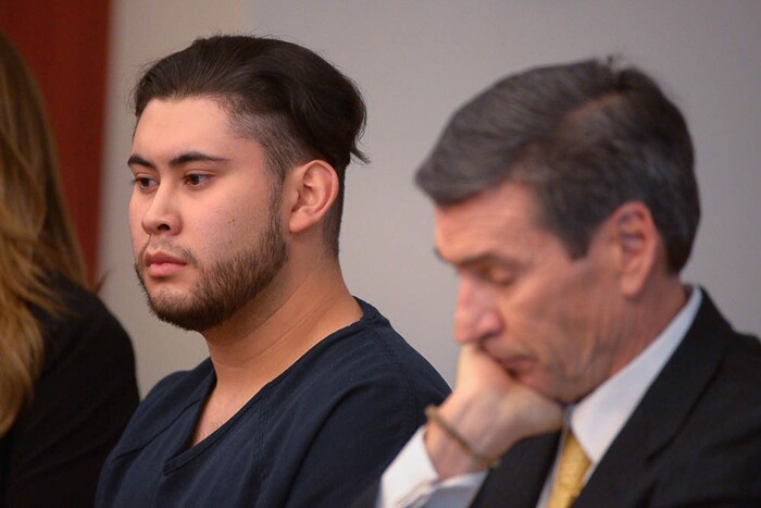 (Trent Nelson | The Salt Lake Tribune)  Abraham Miranda at his sentencing in Salt Lake City, Thursday December 21, 2017. Miranda, 19, pleaded guilty to manslaughter counts for a February crash that killed two of his West High School classmates and critically injured a pregnant woman and her baby. At right is Miranda's attorney Greg Skordas.
