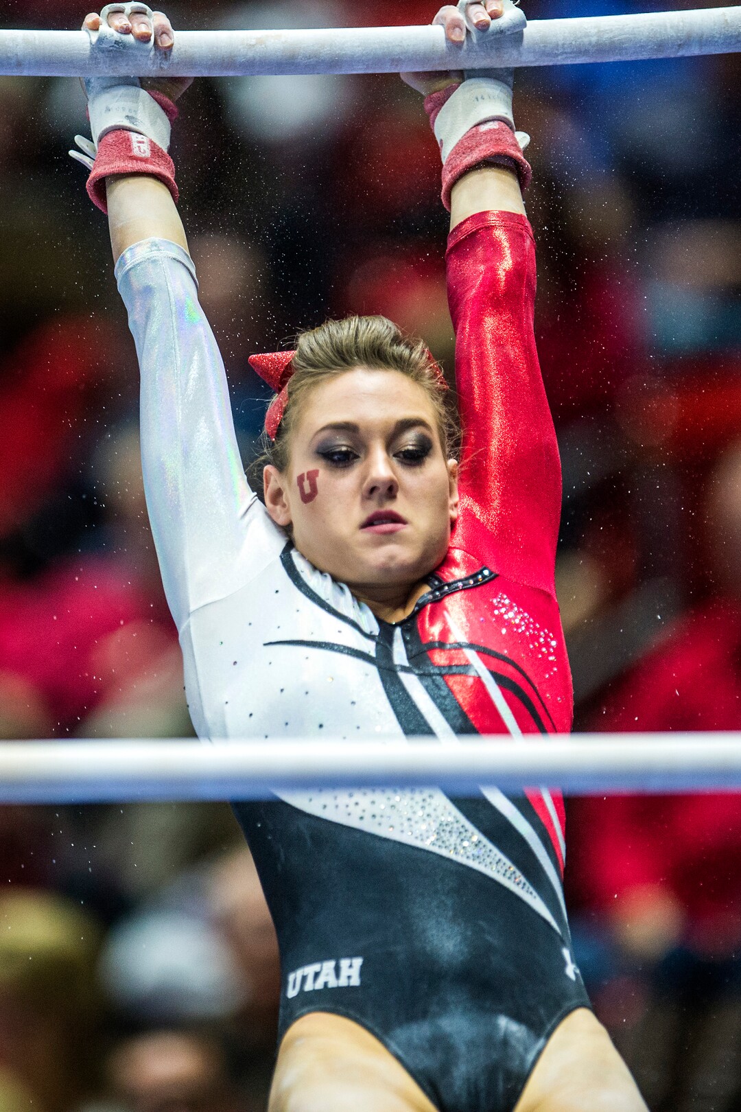 Chris Detrick  |  The Salt Lake TribuneUtah's Tiffani Lewis competes on the bars during the gymnastics meet against BYU at the Huntsman Center Friday January 8, 2016. 