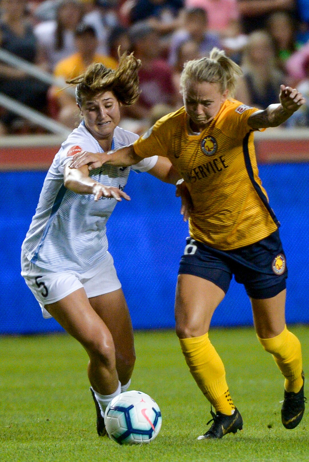 (Leah Hogsten  |  The Salt Lake Tribune) Utah Royals FC midfielder Gunnhildur Jonsdottir (66) battle for the ball as the Utah Royals FC host Sky Blue FC, August 7, 2019 at Rio Tinto Stadium.
