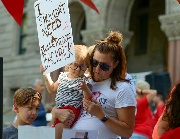(Leah Hogsten  |  The Salt Lake Tribune) Hillary Hewitt broke into tears just thinking about her children Van, left, and daughter Elliott being subjected to gun violence. Members of Moms Demand Action for Gun Sense in America gathered at Washington Square Park to demand change in gun laws in reaction to the August mass shootings in Dayton, Ohio and El Paso, Texas, and the hundreds of Americans who are wounded and killed by gun violence every day.