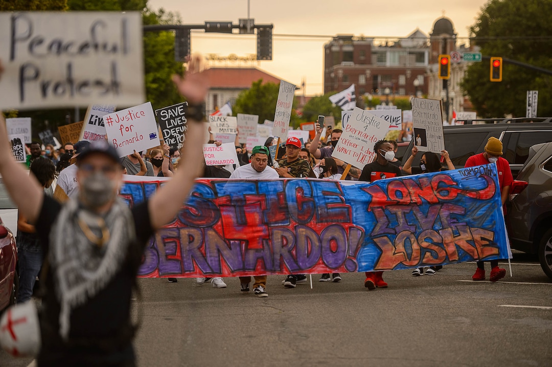 (Trent Nelson  |  The Salt Lake Tribune) People march against police brutality in Salt Lake City on Saturday, June 13, 2020.