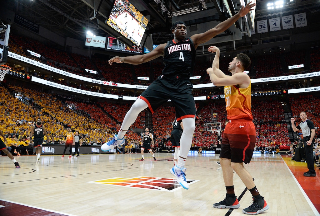(Francisco Kjolseth | The Salt Lake Tribune) Houston Rockets forward Danuel House Jr. (4) tries to block a three-pointer by Utah Jazz forward Georges Niang (31) during the 2019 NBA playoffs. The Jazz are reportedly signing House to a 10-day contract.