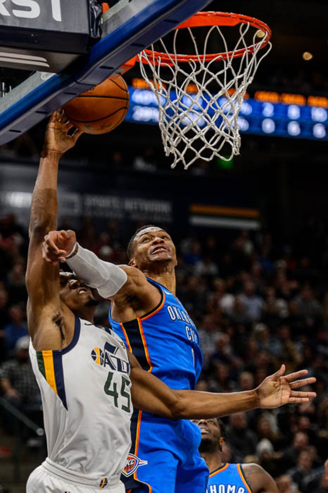(Trent Nelson | The Salt Lake Tribune)  Utah Jazz guard Donovan Mitchell (45) defended by Oklahoma City Thunder guard Russell Westbrook (0) as the Utah Jazz host the Oklahoma City Thunder, NBA basketball in Salt Lake City, Saturday December 23, 2017.