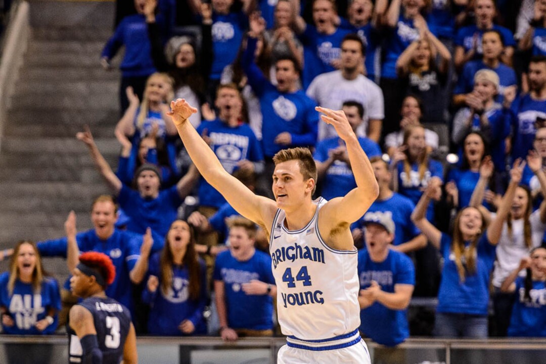 (Trent Nelson | The Salt Lake Tribune)  Brigham Young Cougars guard Connor Harding (44) celebrates a three-pointer as BYU hosts Utah State, NCAA basketball in Provo on Wednesday Dec. 5, 2018.