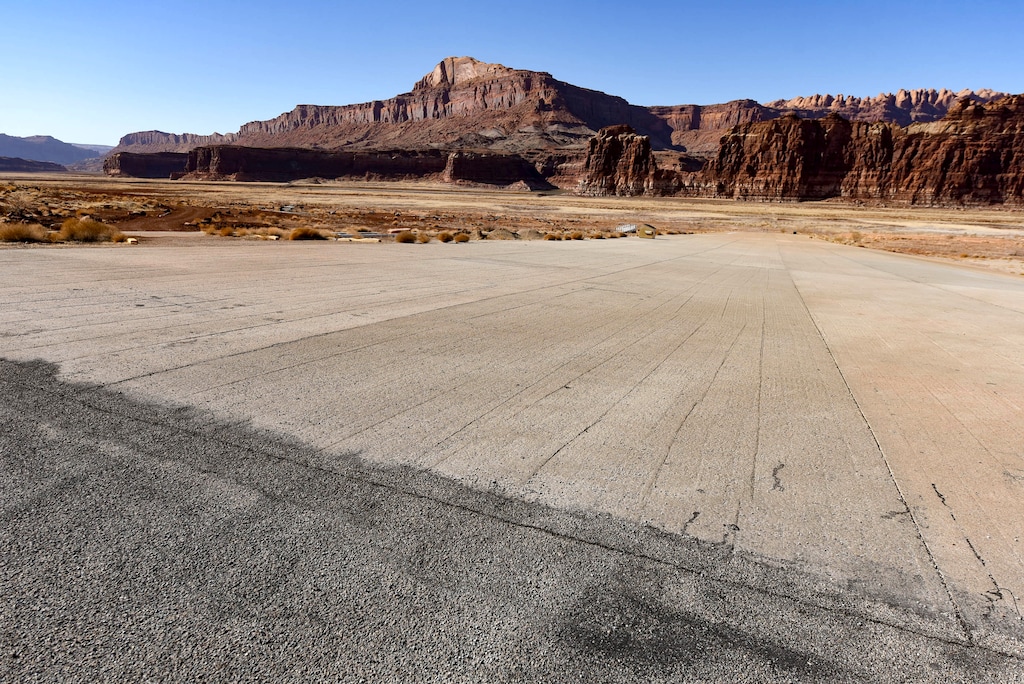 (Francisco Kjolseth  | The Salt Lake Tribune) The Hite Marina boat ramp comes to an end hundreds of yards from the edge of the Colorado River as it flows into Lake Powell on Thursday, Feb. 4, 2021.