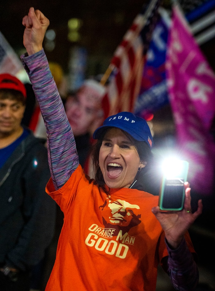 (Rick Egan | The Salt Lake Tribune)  Trump supporters, yell at cars during a rally at Washington Square, on Monday, Nov. 2, 2020.