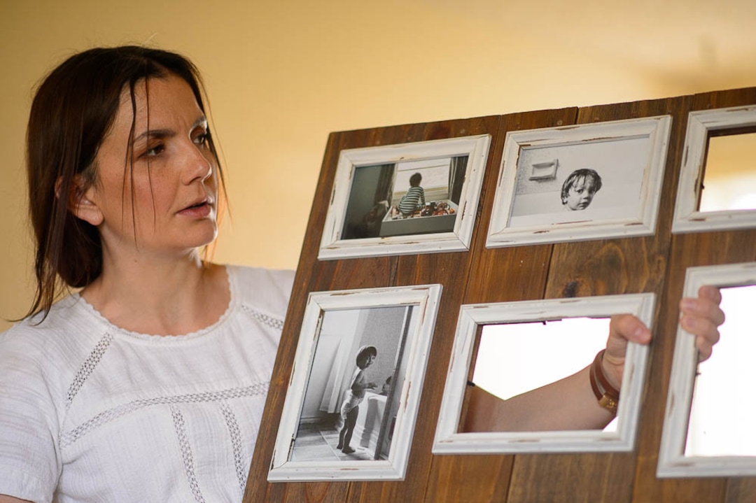 (Trent Nelson  |  The Salt Lake Tribune)  Michelle Densley with photographs of her children in her apartment in Salt Lake County on Monday April 8, 2019.