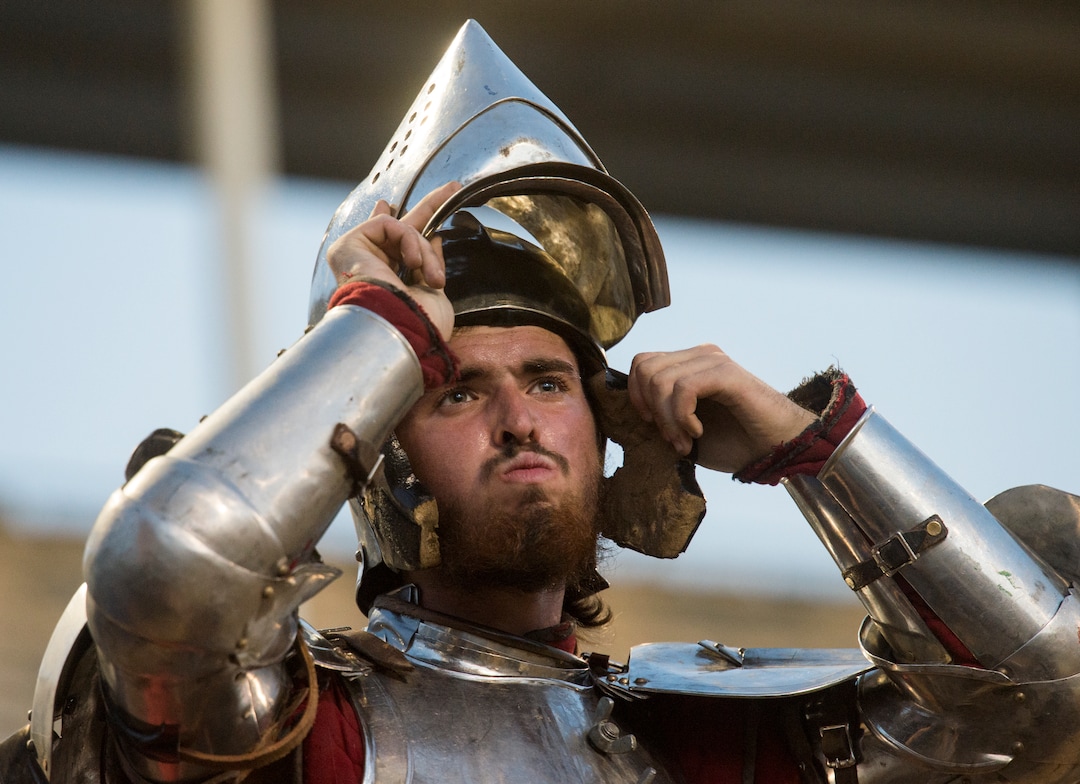 (Rick Egan  |  The Salt Lake Tribune)     Cody Bailey adjusts his helmet as he prepares for the Knights of Mayhem competition, at the Utah State Fair, Thursday, Sept. 6, 2018.
