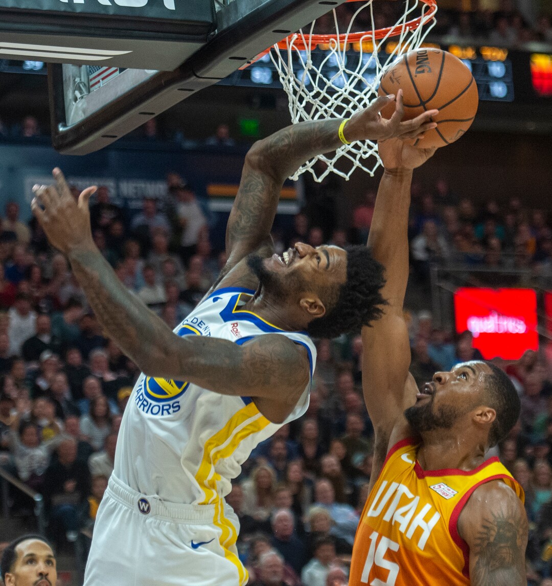 (Rick Egan  |  The Salt Lake Tribune)  Utah Jazz forward Derrick Favors (15) blocks a shot by Golden State Warriors forward Jordan Bell (2), in NBA action between Utah Jazz and Golden State Warriors, in Salt Lake City, Wednesday, Dec. 19, 2018.