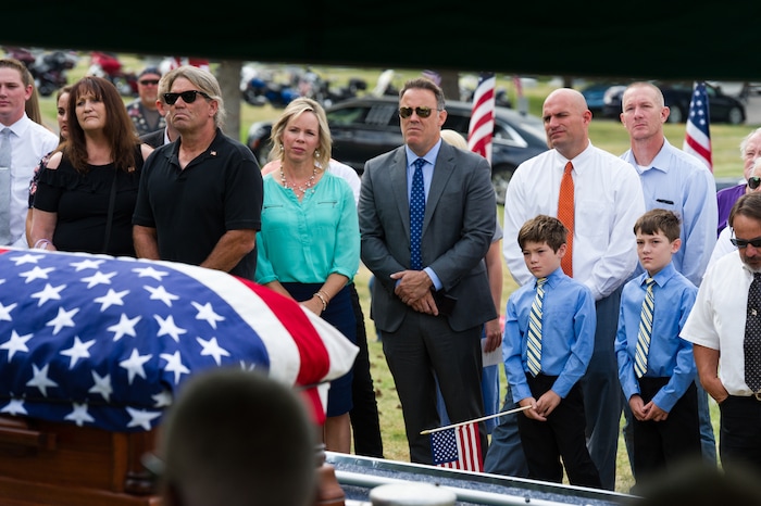 (Alex Gallivan  |  Special to The Tribune) Marine Pfc. Robert K. Holmes, who died 77 years ago aboard the USS Oklahoma during the attack on Pearl Harbor, is laid to rest in the Salt Lake City Cemetery, Monday, Aug. 20, 2018.