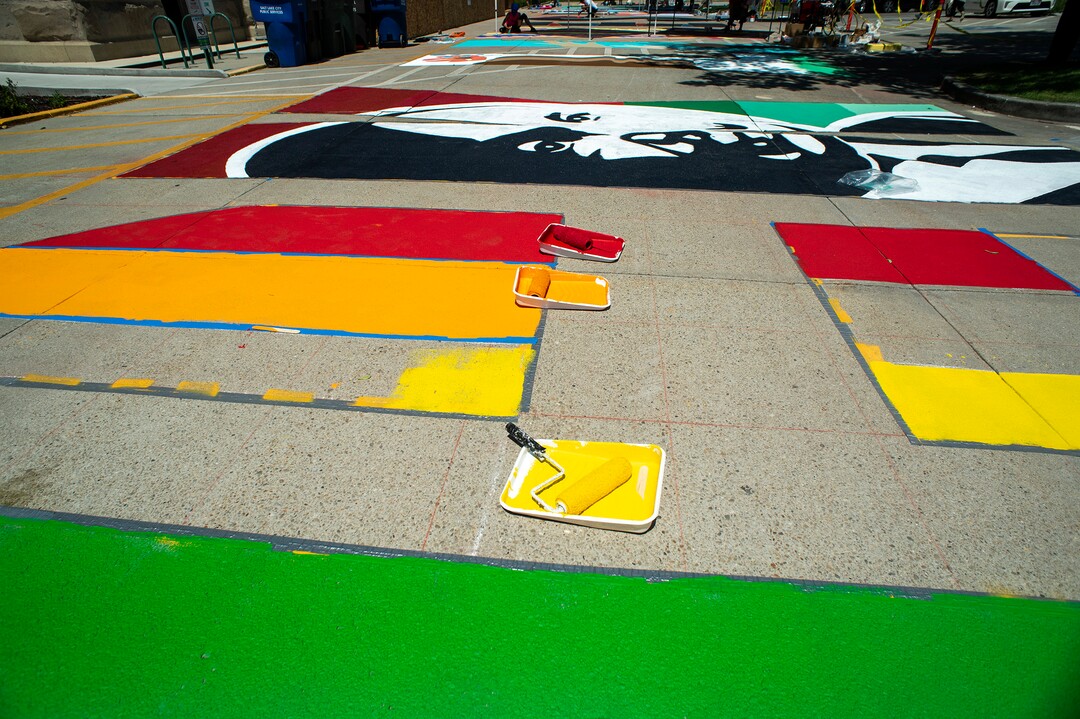 (Rick Egan  |  The Salt Lake Tribune)    Artists paint a Black Lives Matter mural, on the south side of Salt Lake City Hall on Tuesday, Aug. 4, 2020.