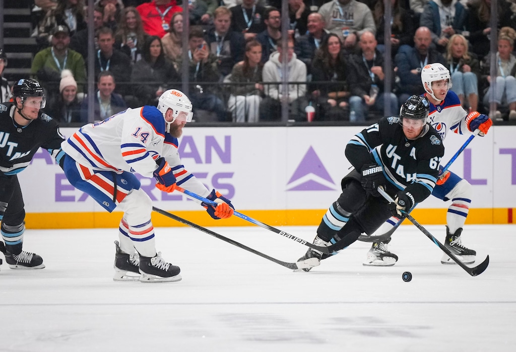 (Bethany Baker  |  The Salt Lake Tribune) Utah Hockey Club left wing Lawson Crouse (67) and Edmonton Oilers defenseman Mattias Ekholm (14) race to the puck during the game at the Delta Center in Salt Lake City on Friday, Nov. 29, 2024.