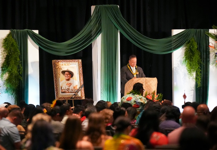 (Bethany Baker  |  The Salt Lake Tribune) Bishop Oliva Schwenke prays as part of the celebration of life for Afa Ah Loo, the man shot and killed during the 'No Kings' protest, during the community event at the Salt Palace Convention Center in Salt Lake City on Friday, June 27, 2025.