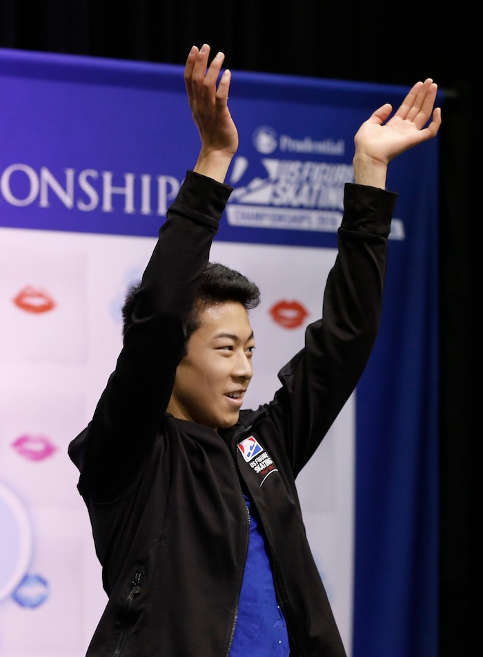 Nathan Chen celebrates after he completed the men's free skate program of the U.S. Figure Skating Championships, Sunday, Jan. 24, 2016, in St. Paul, Minn. Chen picked up the bronze medal in the men's program. (AP Photo/Jim Mone)